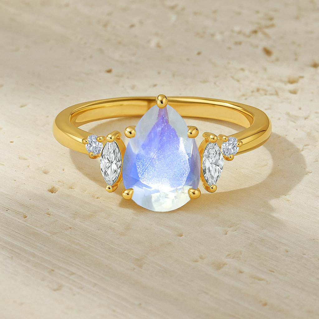 Pear Shape Rainbow Moonstone Solitaire Ring with Cubic Zironia