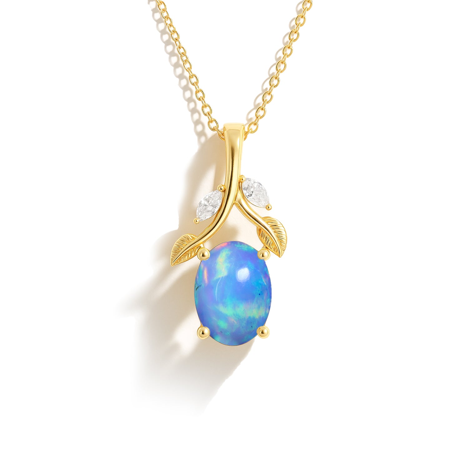 Nature's Opal Pendant in gold with a vivid blue opal and leaf design, ideal for minimalist necklace lovers in the jewelry category.