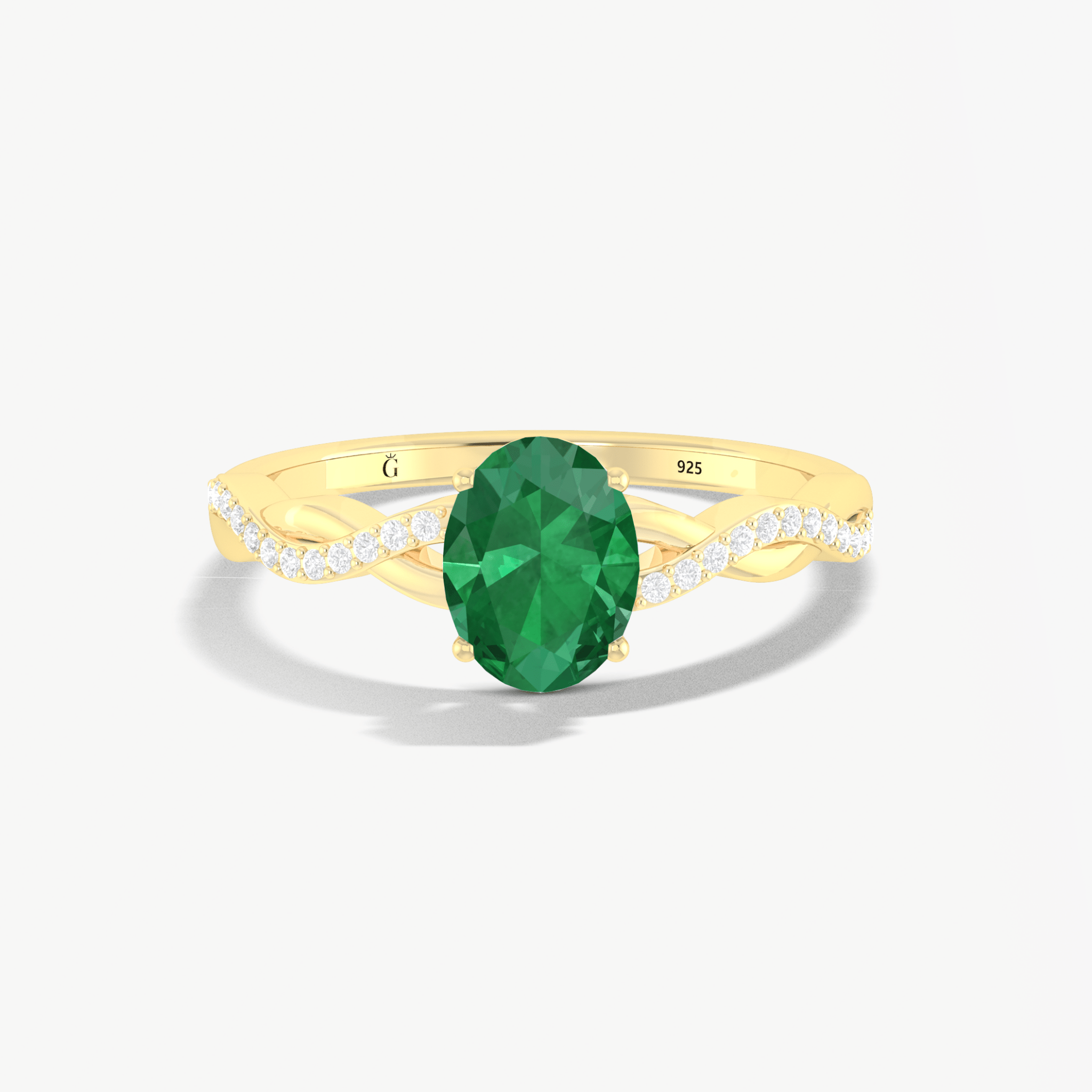 Oval green gemstone ring in prong gold setting