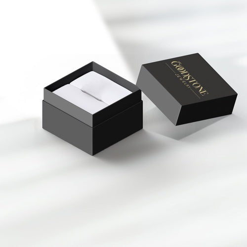 Luxury black jewelry gift box with white cushion interior and Goldstone Designs logo, ideal for presenting 925 Silver Ruby Stud Earrings.