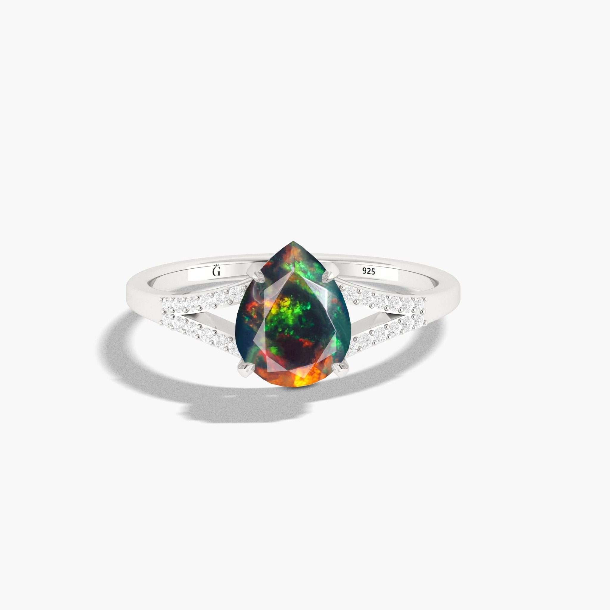 Pear shape opal solitaire engagement ring