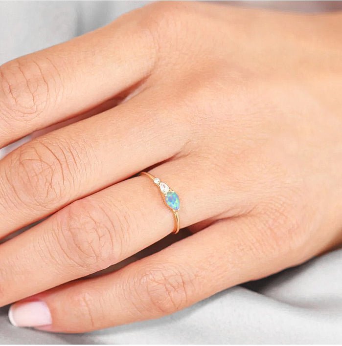 White Fire Opal Pear Three Stone Ring - Goodstone Jewels