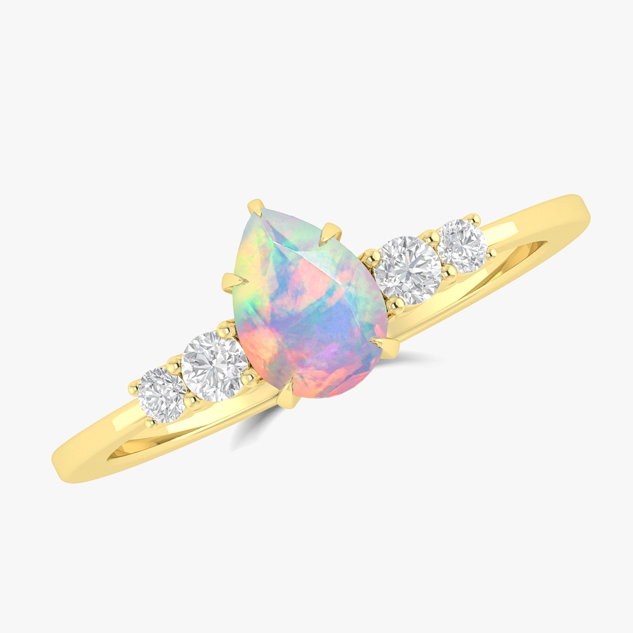 White opal wedding ring faceted pear design